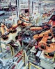 Several Kuka robots in the automotive industry