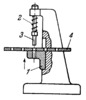 SLIDE OF A HOLE PUNCHING PRESS