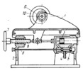 WHEELHEAD BACKLASH ELIMINATION MECHANISM