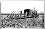 Plow machine driven by internal combustion vehicle.